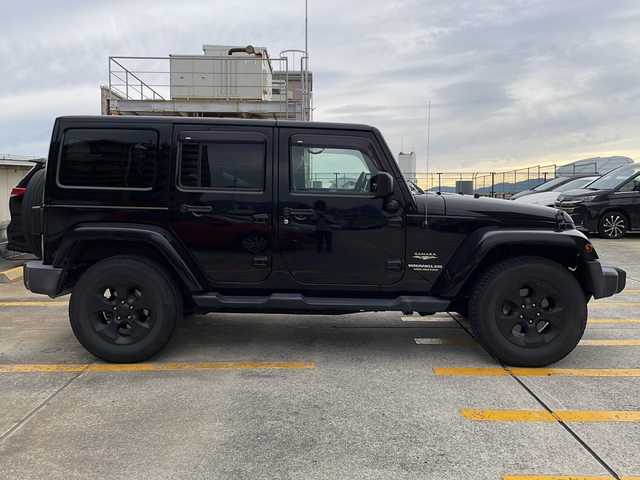 クライスラー・ジープ ジープ ラングラー アンリミテッド サハラ 広島県 2016(平28)年 5.2万km ブラック OP黒革シート/シートヒーター/サイドビューモニター/ヒルディセントコントロール/クルーズコントロール/社外ナビ（DVD/Bluetooth/フルセグTV）/オートライト/純正18インチAW/ETC/リモコンキー