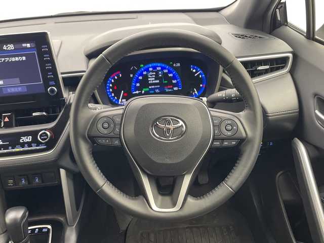 トヨタ カローラ クロス ハイブリッド Z 千葉県 2023(令5)年 2.3万km アティチュードブラックマイカ DNクレーム/純正オーディオ（ＢＴ／ＦＭ／ＡＭ、アップルカーケア、アンドロイドオート）/革ステアリング/ステアリングリモコン/前席社外ラバー調フロアマット/純正ＡＷ/ＬＥＤヘッドライト/純正ＥＴＣ/社外前後ドラレコ