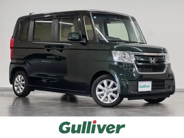 ホンダ Ｎ ＢＯＸ G L ターボ ホンダセンシング 三重県 2019(令1)年 8.5万km ブリティッシュグリーンP ガソリン・ターボ/FF/MTモード付インパネCVT/純正 7インチナビ VXM-204VFi/（CD/DVD/FM/AM/TV/iPod/SD/MusicRack/USB/Bluetooth）/バックカメラ/両側パワースライドドア/ビルトイン ETC/Honda SENSING/・衝突軽減ブレーキ［CMBS］/・車線維持支援システム［LKAS］/・路外逸脱抑制機能/・アダプティブクルーズコントロール［ACC］/・先行車発進お知らせ機能/・標識認識機能/装備/・シートヒーター（D/N）/・オートライト/・LEDヘッドランプ/・オートハイビーム/・パドルシフト/・オートエアコン/・ステアリングスイッチ/・2.5A 急速充電対応 USB充電ジャックx2/・電動格納ドアミラー/・リヤドアロールサンシェード/・プッシュスタート/・14インチAW/・スマートキーx2/・保/取/ナビ取/など
