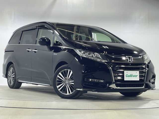 ホンダ オデッセイ ハイブリッド アブソルート・EXホンダセンジング 神奈川県 2018(平30)年 7万km クリスタルブラックパール 純正9型メモリーナビゲーション【VXM-187VfNi】/AM FM フルセグ Bluetooth iPod USB AppleCarPlay /マルチビューカメラシステム/両側パワースライドドア/純正11.6型後席フリップダウンモニター/ホンダセンシング/アダプティブクルーズコントロール/ブラインドスポットモニター/シートヒーター/パワーシート/ビルトインETC/ドライブレコーダー/純正フロアマット/スマートキー/LEDヘッドライト/オートライト/純正17インチアルミホイル/ドアバイザー/レーントレーシングアラート/衝突軽減ブレーキ