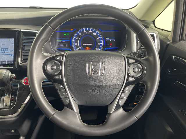 ホンダ オデッセイ ハイブリッド アブソルート・EXホンダセンジング 神奈川県 2018(平30)年 7万km クリスタルブラックパール 純正9型メモリーナビゲーション【VXM-187VfNi】/AM FM フルセグ Bluetooth iPod USB AppleCarPlay /マルチビューカメラシステム/両側パワースライドドア/純正11.6型後席フリップダウンモニター/ホンダセンシング/アダプティブクルーズコントロール/ブラインドスポットモニター/シートヒーター/パワーシート/ビルトインETC/ドライブレコーダー/純正フロアマット/スマートキー/LEDヘッドライト/オートライト/純正17インチアルミホイル/ドアバイザー/レーントレーシングアラート/衝突軽減ブレーキ