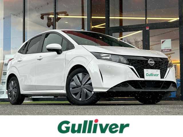 日産 ノート X 大阪府 2023(令5)年 0.8万km ピュアホワイトパール 純正ナビ/ETC/バックカメラ/電動パーキングブレーキ/前後ドライブレコーダー/オートエアコン/オートライト/ステアリングスイッチ/コーナーセンサー/スマートキー/USB接続端子/フロアマット欠品