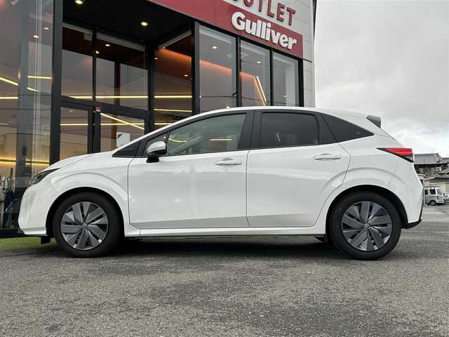 日産 ノート X 大阪府 2023(令5)年 0.8万km ピュアホワイトパール 純正ナビ/ETC/バックカメラ/電動パーキングブレーキ/前後ドライブレコーダー/オートエアコン/オートライト/ステアリングスイッチ/コーナーセンサー/スマートキー/USB接続端子/フロアマット欠品