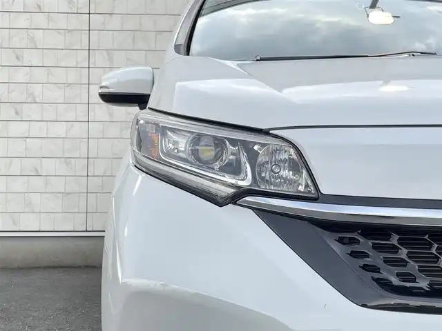 ホンダ フリード G ホンダセンシング 福岡県 2021(令3)年 2.8万km プラチナホワイトパール 純正7型SDナビ(フルセグTV/CD/DVD/BT)バックモニタホンダセンシングレーダークルコン両側パワスラ前後ドラレコETCUSB純正LEDヘッドライト純正アルミホイール純正フロアマットスマートキープッシュスタート
