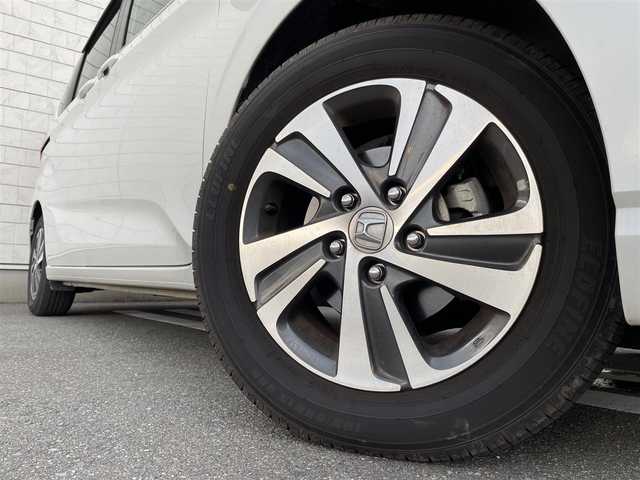 ホンダ フリード G ホンダセンシング 福岡県 2021(令3)年 2.8万km プラチナホワイトパール 純正7型SDナビ(フルセグTV/CD/DVD/BT)バックモニタホンダセンシングレーダークルコン両側パワスラ前後ドラレコETCUSB純正LEDヘッドライト純正アルミホイール純正フロアマットスマートキープッシュスタート