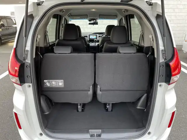 ホンダ フリード G ホンダセンシング 福岡県 2021(令3)年 2.8万km プラチナホワイトパール 純正7型SDナビ(フルセグTV/CD/DVD/BT)バックモニタホンダセンシングレーダークルコン両側パワスラ前後ドラレコETCUSB純正LEDヘッドライト純正アルミホイール純正フロアマットスマートキープッシュスタート
