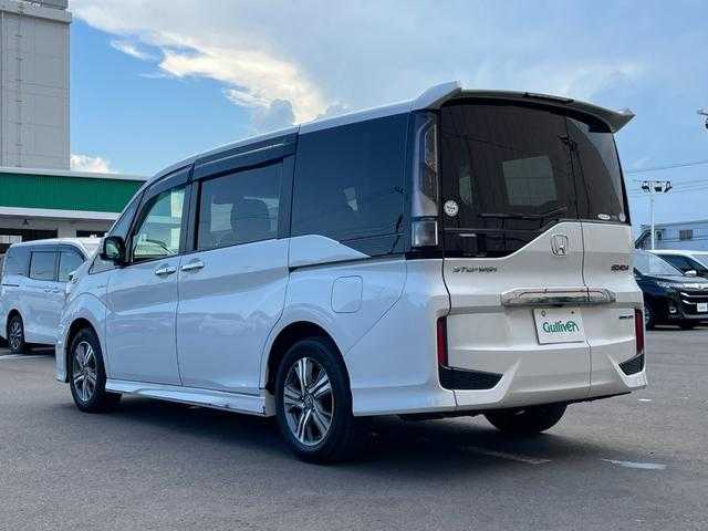 ホンダ ステップワゴン スパーダ eHEV G ホンダS 東京都 2020(令2)年 6.7万km プラチナホワイトパール 純正10型ナビ　/バックモニター　/衝突軽減ブレーキ　/路外逸脱抑制機能　/車線維持支援システム　/アダプティブクルーズコントロール　/両側パワースライドドア　/ETC　/ステアリングスイッチ　/スマートキー　/ECONモード