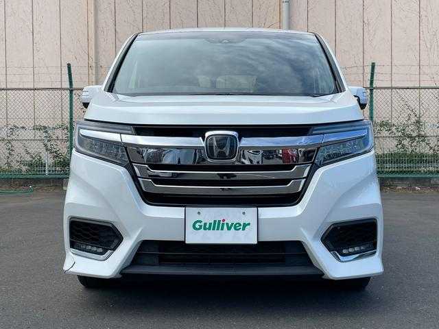 ホンダ ステップワゴン スパーダ eHEV G ホンダS 東京都 2020(令2)年 6.7万km プラチナホワイトパール 純正10型ナビ　/バックモニター　/衝突軽減ブレーキ　/路外逸脱抑制機能　/車線維持支援システム　/アダプティブクルーズコントロール　/両側パワースライドドア　/ETC　/ステアリングスイッチ　/スマートキー　/ECONモード
