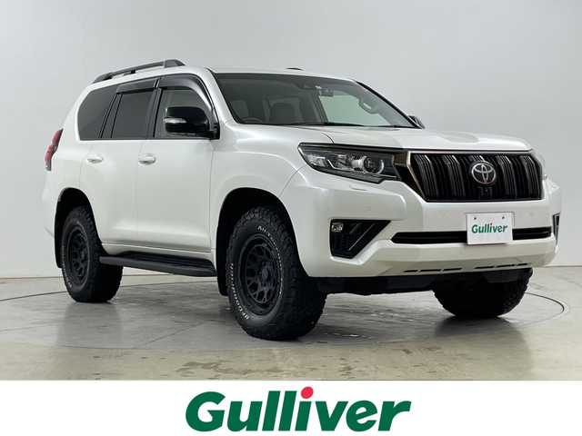 トヨタ ランドクルーザー プラド TX-L 70thアニバーサリーLTD 道央・札幌 2022(令4)年 3.9万km ホワイトパールクリスタルシャイン ・４WD /ディーゼルターボ/寒冷地仕様/・トヨタセーフティセンス/・プリクラッシュセーフティ/・レーダークルーズコントロール/・ムーンルーフ/・純正ディスプレイオーディオ/・ナビ/Bluetooth/USB//・パノラミックビューモニター/・茶レザーシート/運転席.助手席パワーシート/・運転席.助手席ベンチレーション/シートヒーター/・LEDライト/オートハイビーム/・ビルトインETC2.0/ドライブレコーダー/・RAYS17インチアルミホイール/・スタッドレス積み込み有り