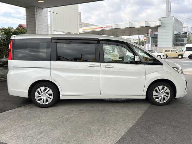 ホンダ ステップワゴン G ホンダセンシング 京都府 2021(令3)年 3.8万km プラチナホワイトパール ワンオーナー　/ホンダセンシング　/ギャザーズ純正ＳＤナビ(VXM-217VFNi)/フルセグTV/Bluetooth/CD/DVD再生機能/禁煙　/バックカメラ /LEDヘッドライト/オートライト /レーダークルーズコントロール /レーンキープアシスト /衝突軽減ブレーキ /ビルトインETC2.0 /サンシェード/ホイールカバー/両側パワースライドドア/ウォークスルー/Wエアバッグ