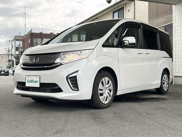 ホンダ ステップワゴン G ホンダセンシング 京都府 2021(令3)年 3.8万km プラチナホワイトパール ワンオーナー　/ホンダセンシング　/ギャザーズ純正ＳＤナビ(VXM-217VFNi)/フルセグTV/Bluetooth/CD/DVD再生機能/禁煙　/バックカメラ /LEDヘッドライト/オートライト /レーダークルーズコントロール /レーンキープアシスト /衝突軽減ブレーキ /ビルトインETC2.0 /サンシェード/ホイールカバー/両側パワースライドドア/ウォークスルー/Wエアバッグ