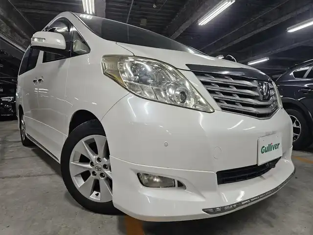 トヨタ アルファード 240G 宮崎県 2008(平20)年 6.8万km ホワイトパールクリスタルシャイン 純正ナビ/フルセグTV/後席用フリップダウンモニター/両側パワースライドドア/バックカメラ/クルーズコントロール/クリアランスソナー/HIDヘッドランプ/オートライト/デュアルオートエアコン/木目調/革巻きコンビステアリング/ステアリングスイッチ/レザー調シートカバー付/前席パワーシート/運転席ポジションメモリー/2列目リラックスキャプテンシート/助手席・2列目オットマン/純正17インチアルミホイール/スマートキー/プッシュエンジンスタート/禁煙車