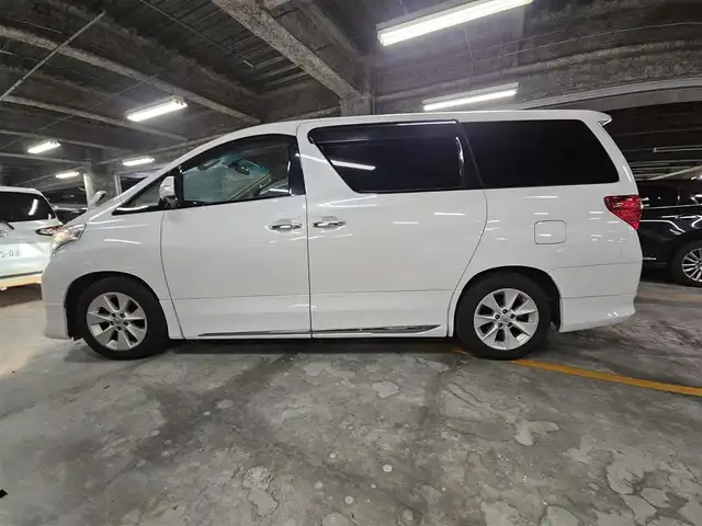 トヨタ アルファード 240G 宮崎県 2008(平20)年 6.8万km ホワイトパールクリスタルシャイン 純正ナビ/フルセグTV/後席用フリップダウンモニター/両側パワースライドドア/バックカメラ/クルーズコントロール/クリアランスソナー/HIDヘッドランプ/オートライト/デュアルオートエアコン/木目調/革巻きコンビステアリング/ステアリングスイッチ/レザー調シートカバー付/前席パワーシート/運転席ポジションメモリー/2列目リラックスキャプテンシート/助手席・2列目オットマン/純正17インチアルミホイール/スマートキー/プッシュエンジンスタート/禁煙車