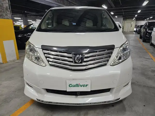 トヨタ アルファード 240G 宮崎県 2008(平20)年 6.8万km ホワイトパールクリスタルシャイン 純正ナビ/フルセグTV/後席用フリップダウンモニター/両側パワースライドドア/バックカメラ/クルーズコントロール/クリアランスソナー/HIDヘッドランプ/オートライト/デュアルオートエアコン/木目調/革巻きコンビステアリング/ステアリングスイッチ/レザー調シートカバー付/前席パワーシート/運転席ポジションメモリー/2列目リラックスキャプテンシート/助手席・2列目オットマン/純正17インチアルミホイール/スマートキー/プッシュエンジンスタート/禁煙車