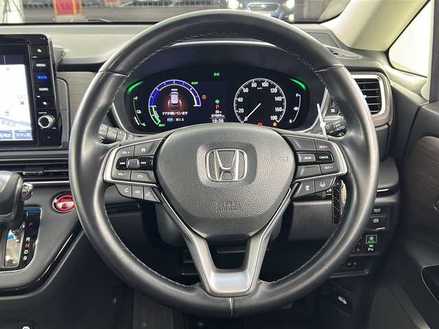 ホンダ オデッセイ ハイブリッド e:HEVアブソルート EX 愛知県 2021(令3)年 1.9万km プレミアムスパークルブラックパール 純正10インチSDナビゲーション/（CD/DVD/フルセグTV/Bluetooth)/全方位カメラ/ホンダセンシング/・レーダークルーズコントロール/・レーンキープアシスト/・ブラインドスポットモニター/・オートマチックハイビーム/・衝突軽減ブレーキ/・クリアランスソナー/ETC２．０/ドライブレコーダー/両側パワースライドドア/シートヒーター(D/N)/パワーシート/LEDヘッドライト/オートライト/フォグライト/純正18インチアルミホイール/ウィンカーミラー/電動格納ミラー/スマートキー/エンジンプッシュスタート/アイドリングストップ/横滑り防止装置/ドアバイザー/フロアマット