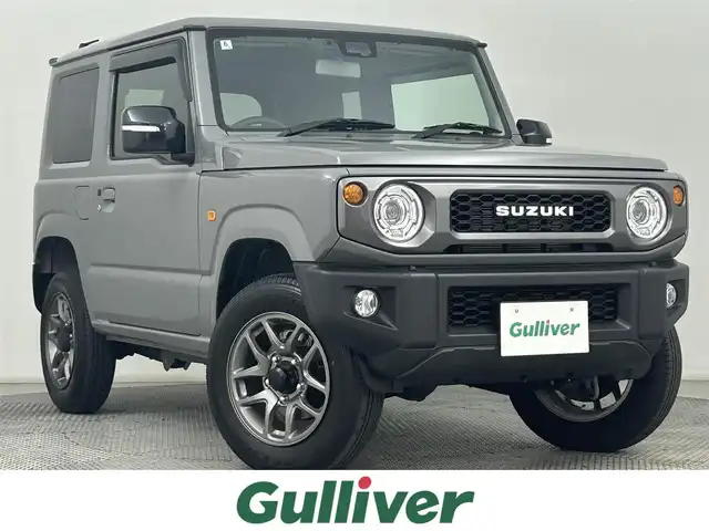 スズキ ジムニー XC 道央・札幌 2024(令6)年 0.8万km ミディアムグレー ・ワンオーナー/・４WD/・純正OPグリル/・メモリーナビ/・フルセグ/・ビルトインETC/・前席シートヒーター/・衝突軽減ブレーキ/・レーンアシスト/・クルーズコントロール/・ダウンヒルアシストコントロール/・ヘッドライトウォッシャー/・ドアミラーヒーター/・プッシュスタート/・スマートキー/・純正フロアマット/・ドアバイザー