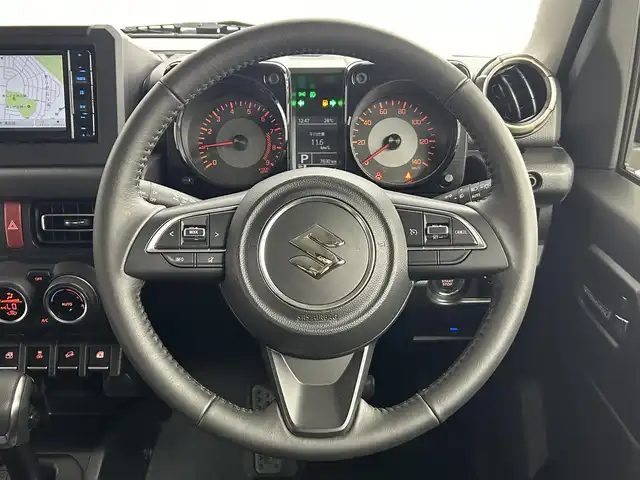 スズキ ジムニー XC 道央・札幌 2024(令6)年 0.8万km ミディアムグレー ・ワンオーナー/・４WD/・純正OPグリル/・メモリーナビ/・フルセグ/・ビルトインETC/・前席シートヒーター/・衝突軽減ブレーキ/・レーンアシスト/・クルーズコントロール/・ダウンヒルアシストコントロール/・ヘッドライトウォッシャー/・ドアミラーヒーター/・プッシュスタート/・スマートキー/・純正フロアマット/・ドアバイザー