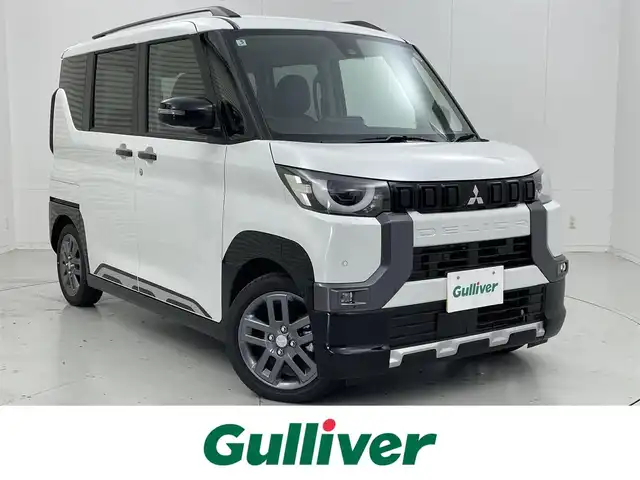 三菱 デリカミニ T プレミアム 茨城県 2025(令7)年 0.1千km アメジストブラック/シルキーホワイト 届済未使用車/純正9型DA/全周囲カメラ/デジタルインナーミラー/リヤサーキュレーター（プラズマクラスター付）/衝突被害軽減ブレーキ/車線逸脱抑制装置/レーダークルーズコントロール/オートマチックハイビーム/クリアランスソナー/両側電動スライドドア/ハーフレザーシート/シートヒーター/ステアリングヒーター/純正15インチAW/LEDヘッドライト/スマートキー