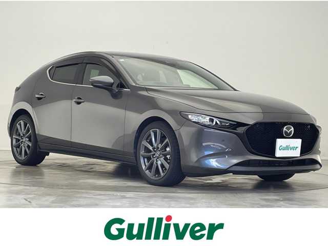 マツダ マツダ３ファストバック 15S ツーリング 滋賀県 2020(令2)年 5万km マシーングレープレミアムM 純正ナビ/AM/FM/CD/DVD/Bluetooth/USB/HDMI/全方位カメラ/ETC/スマートブレーキサポート/レーダークルーズコントロール/車線逸脱警報システム/レーンキープアシスト/ブラインドスポットモニター/LEDヘッドライト/オートライト/オートハイビーム/ヘッドアップディスプレイ/パーキングセンサー/プッシュスタート /スマートキー