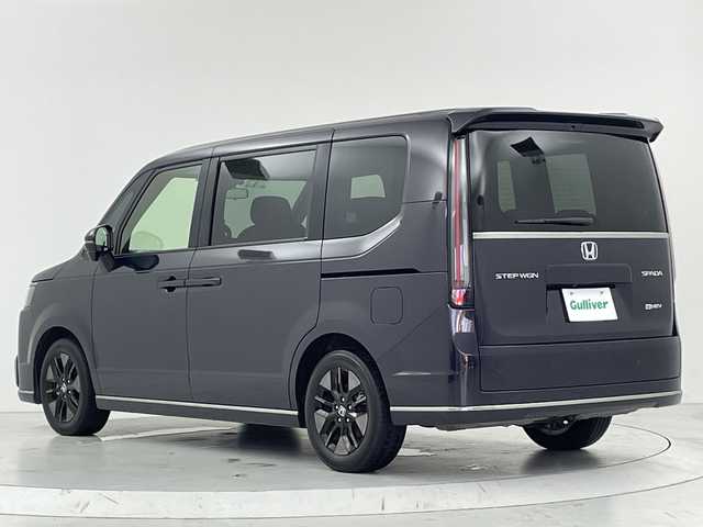 ホンダ ステップワゴン スパーダ eHEV 大阪府 2022(令4)年 3万km トワイライトミストブラックパール ホンダセンシング/・CMBS/・ACC先行車検知/・先行車発進お知らせ/・路外逸脱抑制機能/・LKAS/・BSM/・標識認識機能/・踏み間違い衝突軽減システム/純正11.4インチSDナビ/（CD/DVD/Bluetooth/フルセグ）/バックカメラ/ハーフレザーシート/前席シートヒーター/パドルシフト/ETC/横滑り防止/フロアマット/スマートキー/スペアキー×1本/Wエアバッグ/ABS