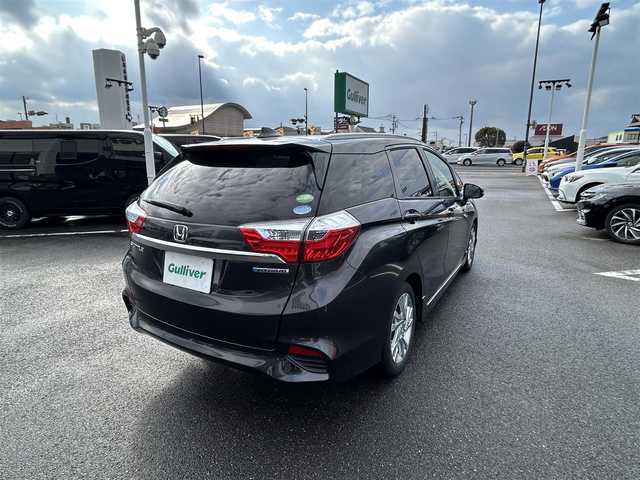 ホンダ シャトル ハイブリッド Z 長崎県 2016(平28)年 7.8万km ルーセブラックM ワンオーナー/純正メモリナビ/（ワンセグ、BT、CD、DVD）/バックカメラ/ハーフレザーシート/純正16インチAW/純正フロアマット/クルーズコントロール/プッシュスタート/スマートキー/ビルトインETC/パドルシフト/ルーフレール/衝突軽減ブレーキ/スペアキー