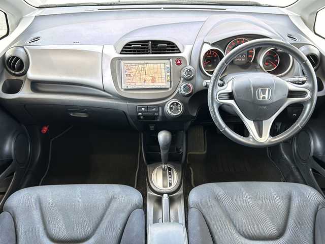 ホンダ フィット スポーティエディション 鳥取県 2010(平22)年 4.5万km ディープサファイアブルーパール ○純正ナビ/○電動格納ミラー/○ETC/○ワンセグ/○バックカメラ/○スタッドレスタイヤ4本積込