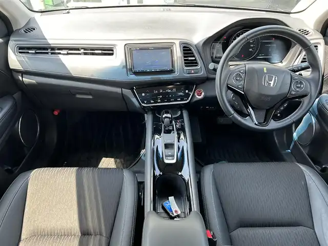 ホンダ ヴェゼル ハイブリッド Z ホンダセンシング 奈良県 2019(令1)年 1.2万km スーパープラチナグレーメタリック ナビ　/フルセグＴＶ　/BT/CD/DVD/SD/iPod/バックカメラ　/ワンオーナー　/ビルトインＥＴＣ　/ＡＡＣ　/ドライブレコーダー　/追従型クルーズコントロール　/ハーフレザーシート　/シートヒーター　/衝突被害軽減システム　/スマートキー/LEDヘッドライト/純正17インチアルミホイール/純正フロアマット