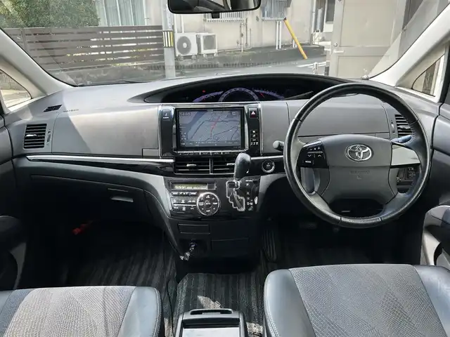 トヨタ エスティマ アエラス プレミアムエディション 愛知県 2013(平25)年 7万km ホワイトパールクリスタルシャイン ワンオーナー/バックカメラ/3列シート/オットマン/SDナビ/Bluetooth/CD/DVD/HDMI/フルセグTV/両側パワースライドドア/クルーズコントロール/パワーシート　D席/純正フロアマット/純正アルミホイール/ビルトインETC/ABS/盗難防止装置/オートライト/エンジンスタートボタン/スマートキー/保証書/取扱説明書