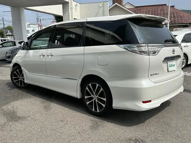 トヨタ エスティマ アエラス プレミアムエディション 愛知県 2013(平25)年 7万km ホワイトパールクリスタルシャイン ワンオーナー/バックカメラ/3列シート/オットマン/SDナビ/Bluetooth/CD/DVD/HDMI/フルセグTV/両側パワースライドドア/クルーズコントロール/パワーシート　D席/純正フロアマット/純正アルミホイール/ビルトインETC/ABS/盗難防止装置/オートライト/エンジンスタートボタン/スマートキー/保証書/取扱説明書