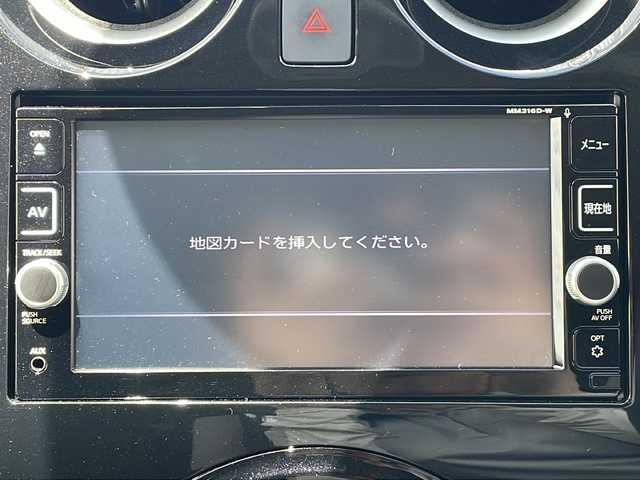 日産 ノート X 三重県 2017(平29)年 1.1万km ホワイト 福祉車両/助手席回転シート/純正ナビ/全周囲モニター/コーナーセンサー/ETC/フロアマット/レーンキープアシスト/衝突軽減ブレーキ/アイドリングストップ/オートライト/ステアリングリモコン/電動格納ミラー/禁煙車
