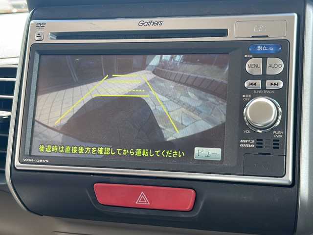 ホンダ Ｎ ＢＯＸ G Lパッケージ 静岡県 2012(平24)年 7.5万km クリスタルブラックパール 【主要装備】/純正ナビ　/両側パワースライドドア　/バックカメラ　/プッシュスタート　/スマートキー　/スペアキー有り　/横滑り防止機能　/バックカメラ　/純正フロアマット　/社外１３インチアルミホイール　/ワンセグテレビ　/ＵＳＢ