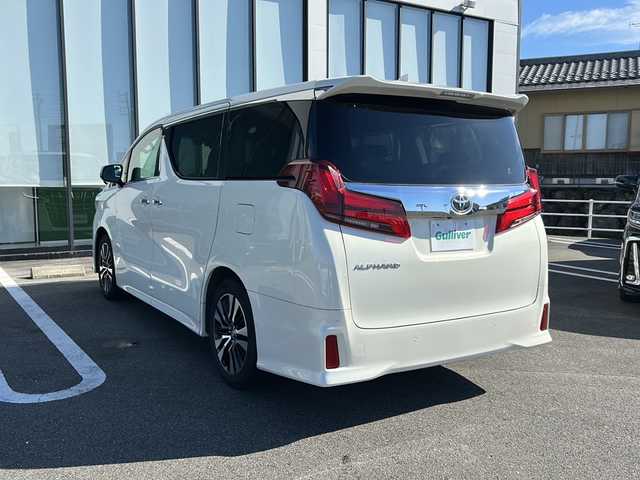 トヨタ アルファード S Cパッケージ 岐阜県 2020(令2)年 7.8万km ラグジュアリーホワイトパールクリスタルシャインガラスフレーク 登録時走行距離77804km/フリップダウンモニター/サンルーフ/禁煙車/純正ディスプレイオーディオ/フルセグＴＶ/両側パワースライドドア/バックカメラ/クルーズコントロール/パワーシート/レザーシート/シートヒーター/エアシート/ステアリングヒーター/純正18インチアルミホイール/社外フロアマット/プッシュスタート/スマートキー/LEDヘッドライト/フォグランプ/オートライト/オートマチックハイビーム/電動リアゲート/衝突被害軽減システム/ETC