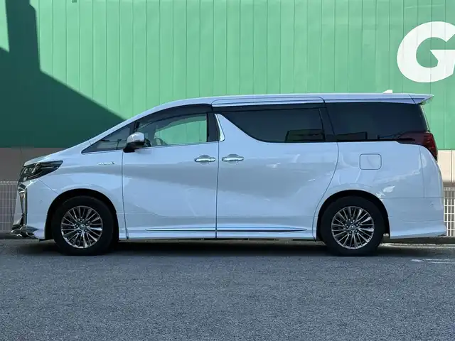 トヨタ アルファードハイブリット エグゼクティブ ラウンジ S 千葉県 2020(令2)年 5.6万km ホワイトパールクリスタルシャイン モデリスタフルエアロ/ツインムーンルーフ/純正メモリーナビ/フルセグ/CD/DVD/BT/USB/JBLプレミアムサウンド/パノラミックビューモニター/リヤエンターテイメントシステム/後席用フリップダウンモニター/パワーバックドア/両側パワースライドドア/デジタルインナーミラー/トヨタセーフティセンス/レーダークルーズコントロール/プリクラッシュセーフティ/レーンキープアシスト/レザーシート/1～2列目パワーシート/シートヒーター/ベンチレーション/ドライブレコーダー/ETC2.0/ステアリングヒーター/オートハイビーム/LEDヘッドライト/フォグランプ/スマートキー×2