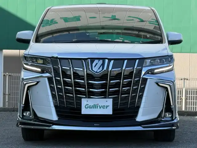 トヨタ アルファードハイブリット エグゼクティブ ラウンジ S 千葉県 2020(令2)年 5.6万km ホワイトパールクリスタルシャイン モデリスタフルエアロ/ツインムーンルーフ/純正メモリーナビ/フルセグ/CD/DVD/BT/USB/JBLプレミアムサウンド/パノラミックビューモニター/リヤエンターテイメントシステム/後席用フリップダウンモニター/パワーバックドア/両側パワースライドドア/デジタルインナーミラー/トヨタセーフティセンス/レーダークルーズコントロール/プリクラッシュセーフティ/レーンキープアシスト/レザーシート/1～2列目パワーシート/シートヒーター/ベンチレーション/ドライブレコーダー/ETC2.0/ステアリングヒーター/オートハイビーム/LEDヘッドライト/フォグランプ/スマートキー×2