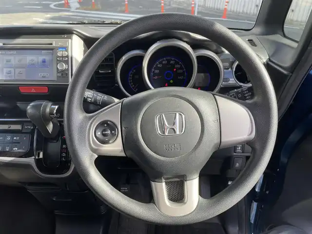 ホンダ Ｎ ＢＯＸ カスタム G Lパッケージ 福岡県 2012(平24)年 10.7万km プレミアムダイナミックブルーパール (株)IDOMが運営する【じしゃロン八幡西店】の自社ローン対象車両になります。こちらは現金ご利用時の価格です。自社ローンご希望の方は別途その旨お申付け下さい。/・ナビ（VXM-128VS）/・バックカメラ/・片側パワースライド/・ETC/・プッシュスタート/・純正フロアマット