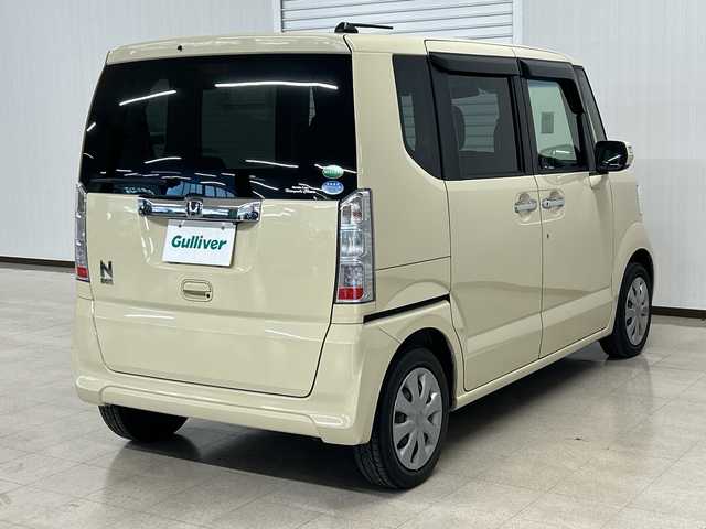 ホンダ Ｎ ＢＯＸ G L SSパッケージ 熊本県 2015(平27)年 6.2万km クッキークリーム 社外ＳＤナビ（ＣＤ/ＤＶＤ/フルセグ/ラジオ）/バックカメラ/ＥＴＣ/両側パワースライドドア/衝突軽減システム/横滑り防止装置/ステアリングスイッチ/プッシュスタート/スマートキー×２/ドアバイザー/純正フロアマット/リアサンシェード