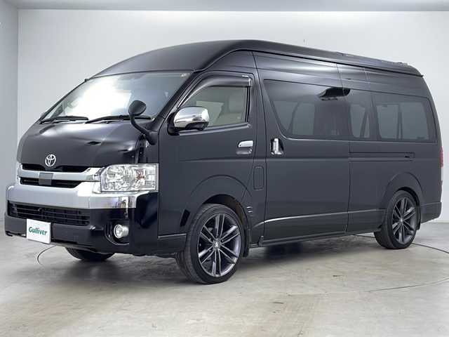 トヨタ ハイエース グランドキャビン 道央・札幌 2018(平30)年 11.2万km ブラック ・アルパインナビ（TV＆CD＆DVD＆BT＆SD＆HDMI）/・アルパインフリップダウンモニター/・バックカメラ/・衝突被害軽減ブレーキ/・オートマチックハイビーム/・横滑り防止/・ベットキット/・ドライブレコーダー（前後）/・社外レーダー/・ビルトインETC/・シートヒーター/・片側パワースライドドア/・スマートキー/・スペアキー/・ヒッチメンバー/・積込純正AWキャップ付きサマータイヤ