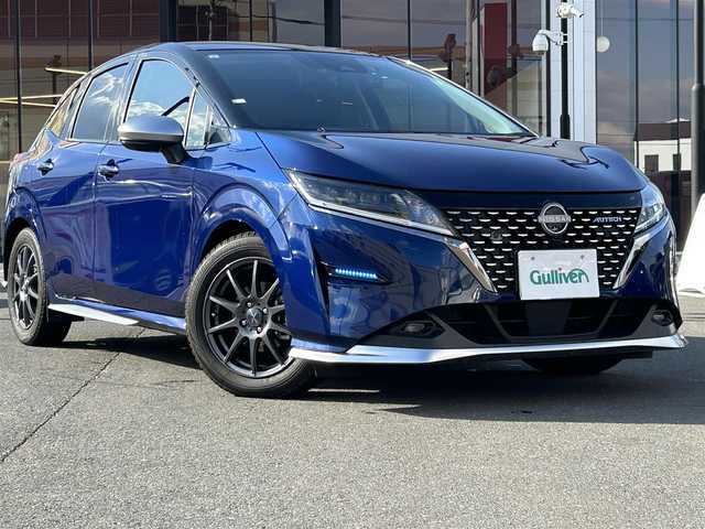 日産 ノート オーテック 宮城県 2021(令3)年 5万km オーロラフレアブルーパール /スーパーブラック 2トーン 登録時走行距離49127km/純正メモリナビ【Bluetooth】/フルセグTV/バックカメラ/全周囲カメラ/衝突軽減ブレーキ/レーンキープ/追従クルコン/シートヒーター/プッシュスタート/LEDライト/ETC/純正ホイール/置くだけ充電/ステアリングスイッチ/純正ホイール付きサマータイヤ積込/プロパイロット/電動格納ミラー/禁煙車/フォグランプ