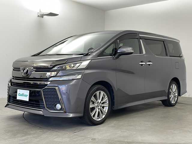 トヨタ ヴェルファイア 3.5ZA ゴールデンアイズ 兵庫県 2016(平28)年 7.1万km ウォームグレーオパール ・純正10インチナビ&Bluetooth&CD&DVD&SD&TV/・純正リアフリップダウンモニター/・クルーズコントロール/・オートライト/・バックカメラ/・前方ドライブレコーダー/・前後コーナーセンサー/・ハーフレザーシート/・nanoe/・ビルドインETC/・両側パワースライドドア/・パワーバックドア/・純正アルミホイール/・純正フロアマット/・ハーフレザーシート/・LEDヘッドライト/・ウォークスルー/・ドアバイザー/・フロントフォグランプ/・スマートキー/・プッシュスタート/・ECO MODE/・取扱説明書/・保証書