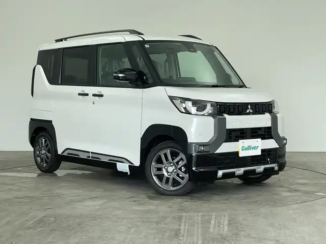 三菱 デリカミニ T プレミアム 三重県 2025(令7)年 0.1千km 白Ⅱ /届出済未使用車//純正ディスプレイオーディオ//AppleCarPray/AndroidAuto/iPod/Bluetooth/AM/FM/USB//前席シートヒーター//ステアリングヒーター//デジタルインナーミラー//レーダークルーズコントロール//ハンズフリースライドドア//パドルシフト//両側パワースライドドア//電動パーキング//純正15インチAW
