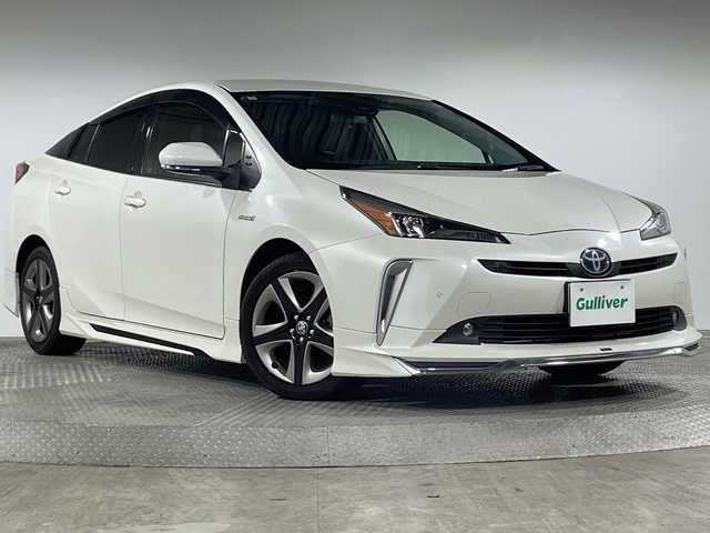 トヨタ プリウス Sツーリングセレクション 神奈川県 2020(令2)年 6.3万km ホワイトパールクリスタルシャイン トヨタセーフティセンス/社外9型ナビ/・BT/フルセグTV/CD/DVD/SD/USB/AM/FM/バックカメラ/モデリスタエアロ(F/S/R)/ビルトインETC/革巻きステアリング/ステアリングスイッチ/Autoライト/合皮シート/シートヒーター(D/N)/ECO/POWERモード/シートリフター/スマートキー/スペアキー/プッシュスタートボタン/LEDヘッドライト/フォグランプ/電動格納ミラー/ウィンカーミラー/純正フロアマット/純正ドアバイザー/純正アルミホイール