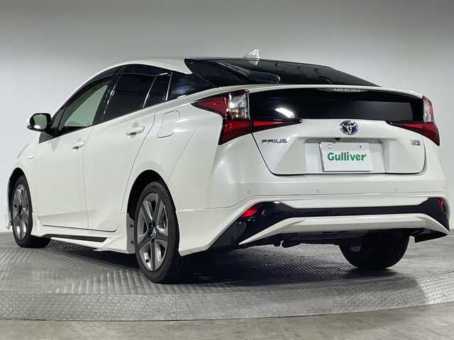 トヨタ プリウス Sツーリングセレクション 神奈川県 2020(令2)年 6.3万km ホワイトパールクリスタルシャイン トヨタセーフティセンス/社外9型ナビ/・BT/フルセグTV/CD/DVD/SD/USB/AM/FM/バックカメラ/モデリスタエアロ(F/S/R)/ビルトインETC/革巻きステアリング/ステアリングスイッチ/Autoライト/合皮シート/シートヒーター(D/N)/ECO/POWERモード/シートリフター/スマートキー/スペアキー/プッシュスタートボタン/LEDヘッドライト/フォグランプ/電動格納ミラー/ウィンカーミラー/純正フロアマット/純正ドアバイザー/純正アルミホイール