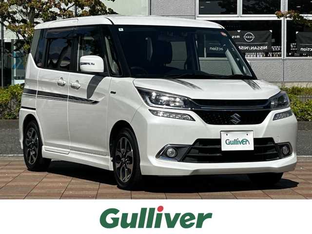 スズキ ソリオ バンディット HV MV Dカメラ ブレーキS 福島県 2016(平28)年 2.2万km ピュアホワイトP 純正SDナビ【CN-R302WZ】/【AM/FM/USB/HDMI/CD/DVD】/フルセグテレビ/バックカメラ/本革巻きステアリング/ステアリングスイッチ/プッシュアップスタート/運転席シートヒーター/ワンオーナー/クルーズコントロール/両側パワースライドドア/安全装備/・デユアルカメラブレーキサポート/・車線維持支援機能/・車線逸脱機能/・ふらつき警報フルオートエアコン/LEDオートライト/フォグランプ/純正フロアマット/15インチ純正アルミホイール/電動格納ウインカーミラー/ドアバイザー/スマートキー/取扱説明書/保証書