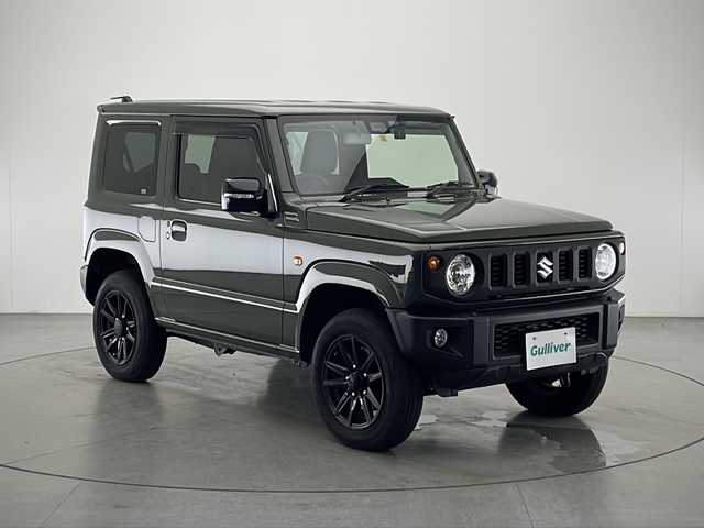 スズキ ジムニー XC 宮崎県 2022(令4)年 3.9万km ジャングルグリーン 禁煙車/衝突被害軽減ブレーキ/社外ナビTV/（ストラーダ/CN-HE01D/CD/Bluetooth/フルセグTV)/社外バックカメラ/社外ETC/社外前後ドライブレコーダー/純正16インチアルミ/純正セキュリティアラーム/純正シートカバー/純正LEDオートライト/純正フォグ/純正フロアマット/クルーズコントロール/オートマチックハイビーム/レーンディパーチャーアラート/ダウンヒルアシストコントロール/前席シートヒーター/オートエアコン/本革巻ハンドル/スマートキー/プッシュエンジンスタート/新車時保証書/取扱い説明書