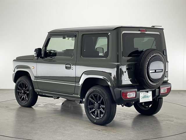 スズキ ジムニー XC 宮崎県 2022(令4)年 3.9万km ジャングルグリーン 禁煙車/衝突被害軽減ブレーキ/社外ナビTV/（ストラーダ/CN-HE01D/CD/Bluetooth/フルセグTV)/社外バックカメラ/社外ETC/社外前後ドライブレコーダー/純正16インチアルミ/純正セキュリティアラーム/純正シートカバー/純正LEDオートライト/純正フォグ/純正フロアマット/クルーズコントロール/オートマチックハイビーム/レーンディパーチャーアラート/ダウンヒルアシストコントロール/前席シートヒーター/オートエアコン/本革巻ハンドル/スマートキー/プッシュエンジンスタート/新車時保証書/取扱い説明書