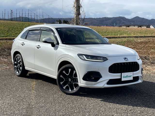 ホンダ ＺＲ－Ｖ ハイブリッド e:HEV Z 新潟県 2023(令5)年 2.2万km プラチナホワイトパール 4WD/純正9インチインターナビ/BT/USB/フルセグテレビ/全方位カメラ/ETC2.0/ドライブレコーダー/衝突被害軽減ブレーキ/レーンキープアシスト/レーダークルーズコントロール/革シート/パワーシート/シートヒーター/ステアリングヒーター/ステアリングスイッチ/パドルシフト/コーナーセンサー/パワーバックドア/BOSEスピーカー/スマートキー/プッシュスタート/LEDヘッドライト/オートライト/オートハイビーム/フォグランプ/純正18インチアルミホイール