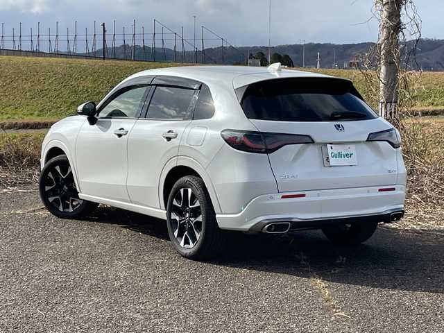 ホンダ ＺＲ－Ｖ ハイブリッド e:HEV Z 新潟県 2023(令5)年 2.2万km プラチナホワイトパール 4WD/純正9インチインターナビ/BT/USB/フルセグテレビ/全方位カメラ/ETC2.0/ドライブレコーダー/衝突被害軽減ブレーキ/レーンキープアシスト/レーダークルーズコントロール/革シート/パワーシート/シートヒーター/ステアリングヒーター/ステアリングスイッチ/パドルシフト/コーナーセンサー/パワーバックドア/BOSEスピーカー/スマートキー/プッシュスタート/LEDヘッドライト/オートライト/オートハイビーム/フォグランプ/純正18インチアルミホイール
