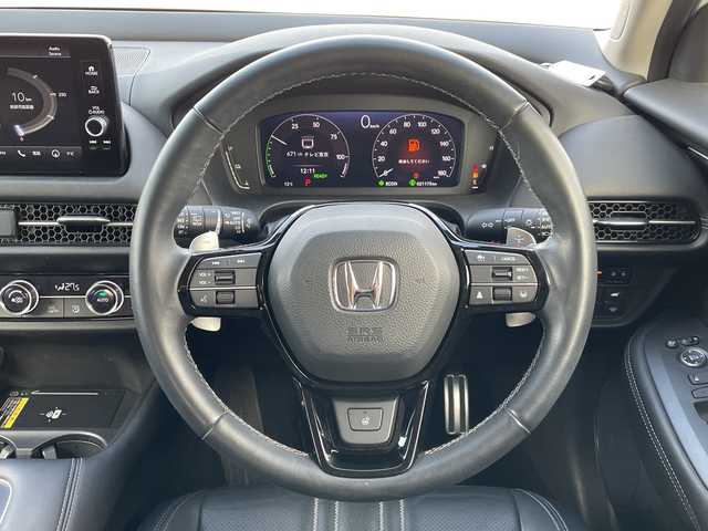 ホンダ ＺＲ－Ｖ ハイブリッド e:HEV Z 新潟県 2023(令5)年 2.2万km プラチナホワイトパール 4WD/純正9インチインターナビ/BT/USB/フルセグテレビ/全方位カメラ/ETC2.0/ドライブレコーダー/衝突被害軽減ブレーキ/レーンキープアシスト/レーダークルーズコントロール/革シート/パワーシート/シートヒーター/ステアリングヒーター/ステアリングスイッチ/パドルシフト/コーナーセンサー/パワーバックドア/BOSEスピーカー/スマートキー/プッシュスタート/LEDヘッドライト/オートライト/オートハイビーム/フォグランプ/純正18インチアルミホイール