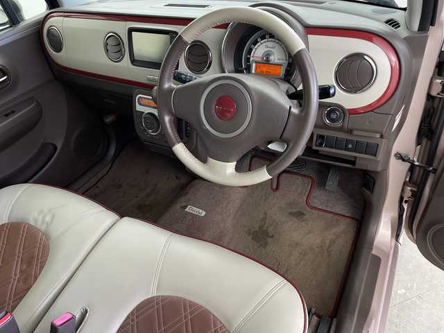 スズキ ラパン ショコラ X 鹿児島県 2014(平26)年 6.5万km シャンパンピンクPM 純正ナビ/(BT/AM/FM/ワンセグTV)/前方ドライブレコーダー/バックカメラ/レザーシート/アイドリングストップ/革巻きステアリング/ウィンカーミラー/ベンチシート/純正フロアマット/オートライト