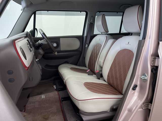 スズキ ラパン ショコラ X 鹿児島県 2014(平26)年 6.5万km シャンパンピンクPM 純正ナビ/(BT/AM/FM/ワンセグTV)/前方ドライブレコーダー/バックカメラ/レザーシート/アイドリングストップ/革巻きステアリング/ウィンカーミラー/ベンチシート/純正フロアマット/オートライト